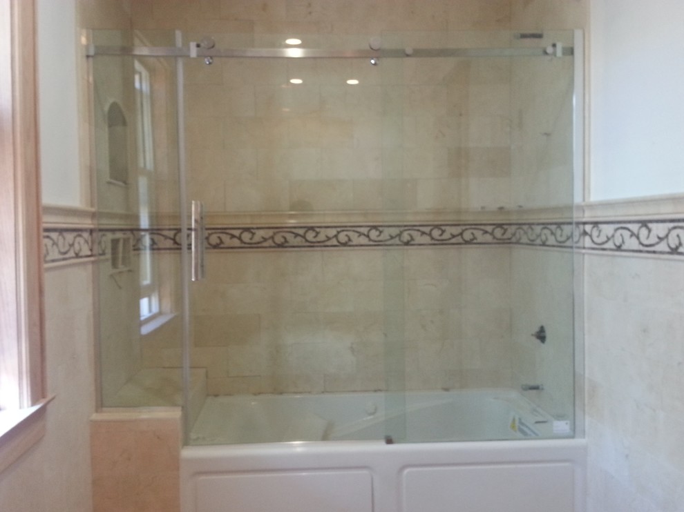 Frameless shower enclosures