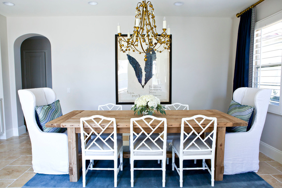 This is an example of a mid-sized transitional separate dining room in Orange County with no fireplace.