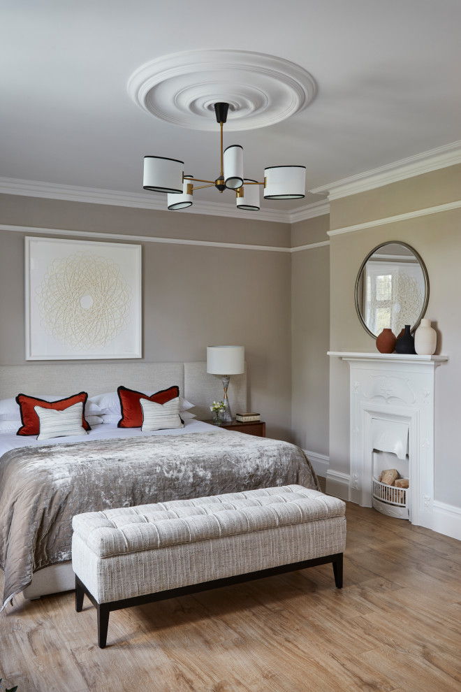 Photo of a transitional bedroom in Surrey.