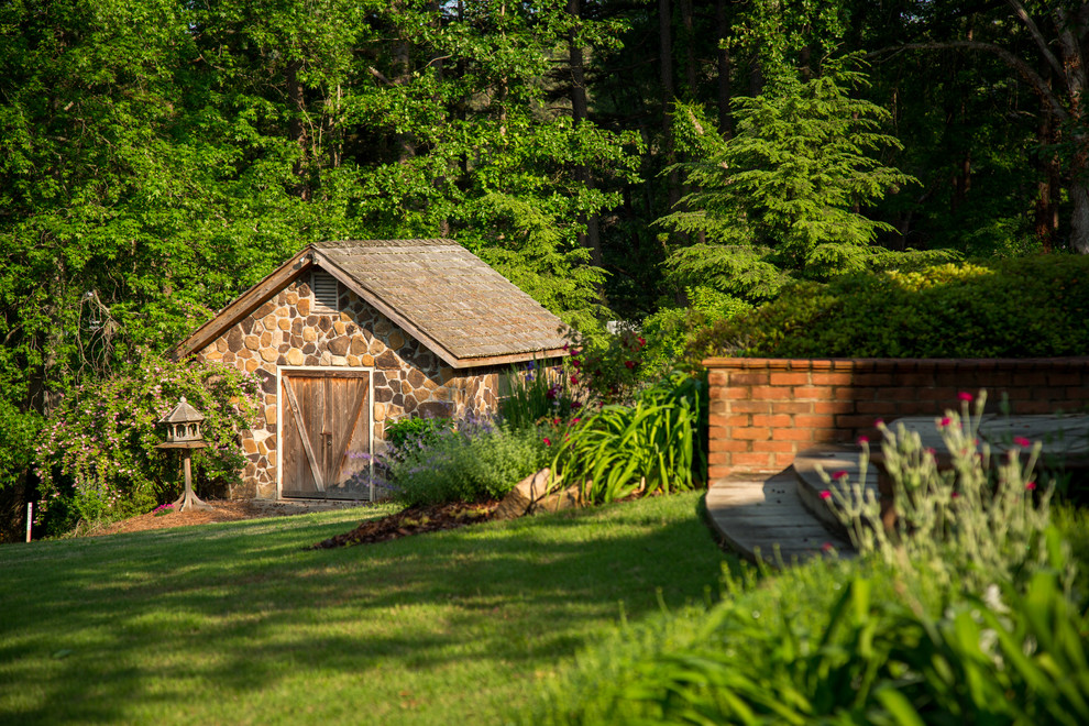 Inspiration for an expansive traditional detached garden shed in Atlanta.