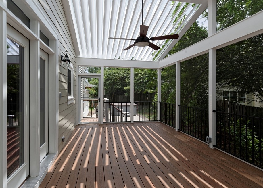 Inspiration for a large arts and crafts backyard deck in DC Metro with a pergola.