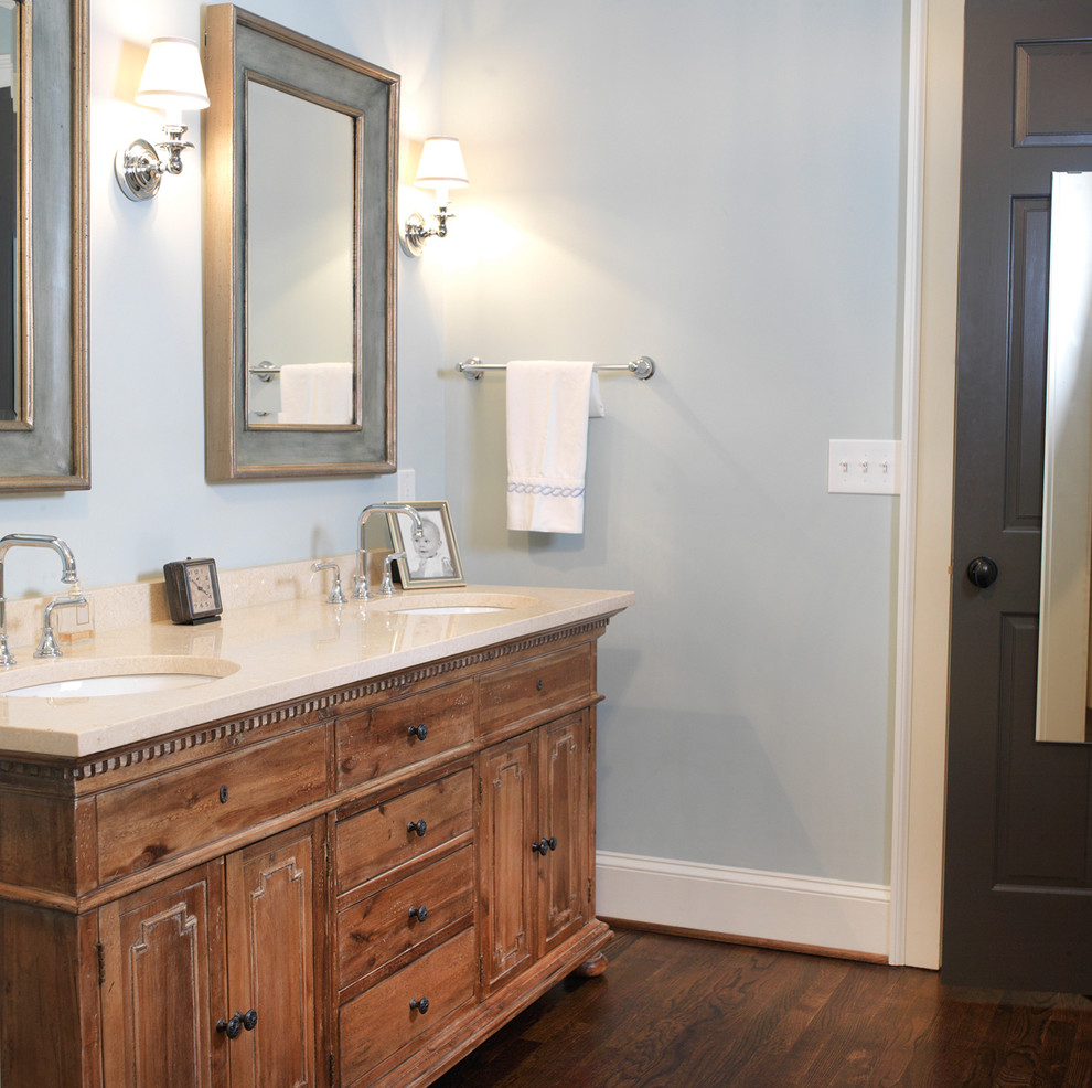 Inspiration for a transitional bathroom in Atlanta with recessed-panel cabinets.