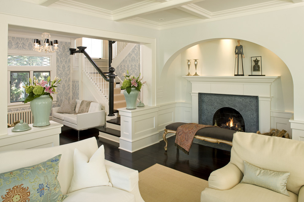 Inspiration for a traditional living room in Minneapolis with white walls and a standard fireplace.