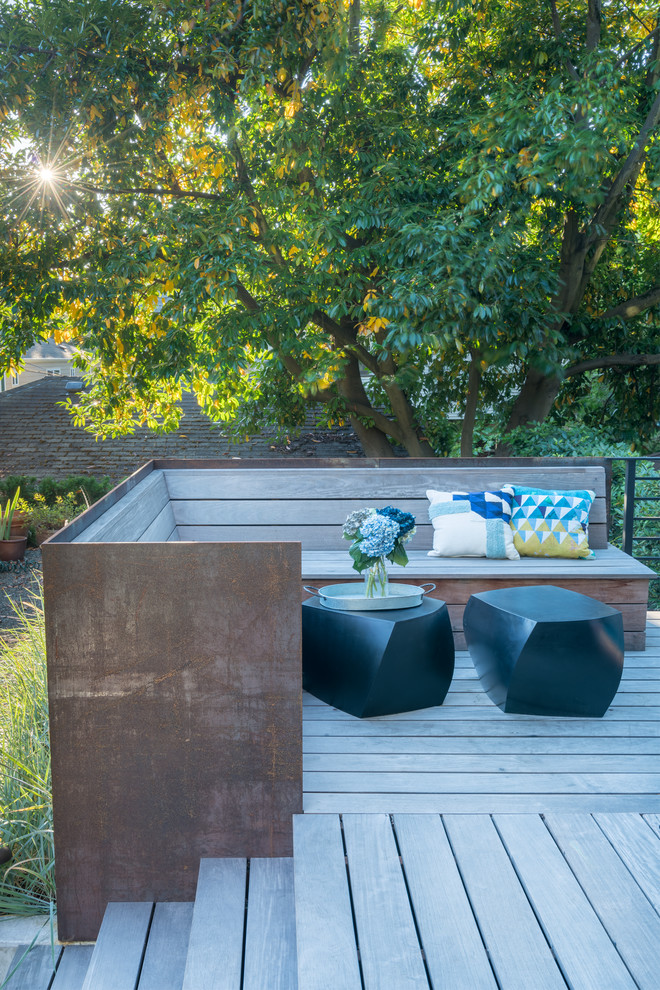 Deck - mid-sized modern backyard deck idea in Seattle with no cover