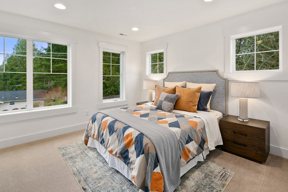 Medium sized bedroom in Seattle with white walls, carpet and beige floors.