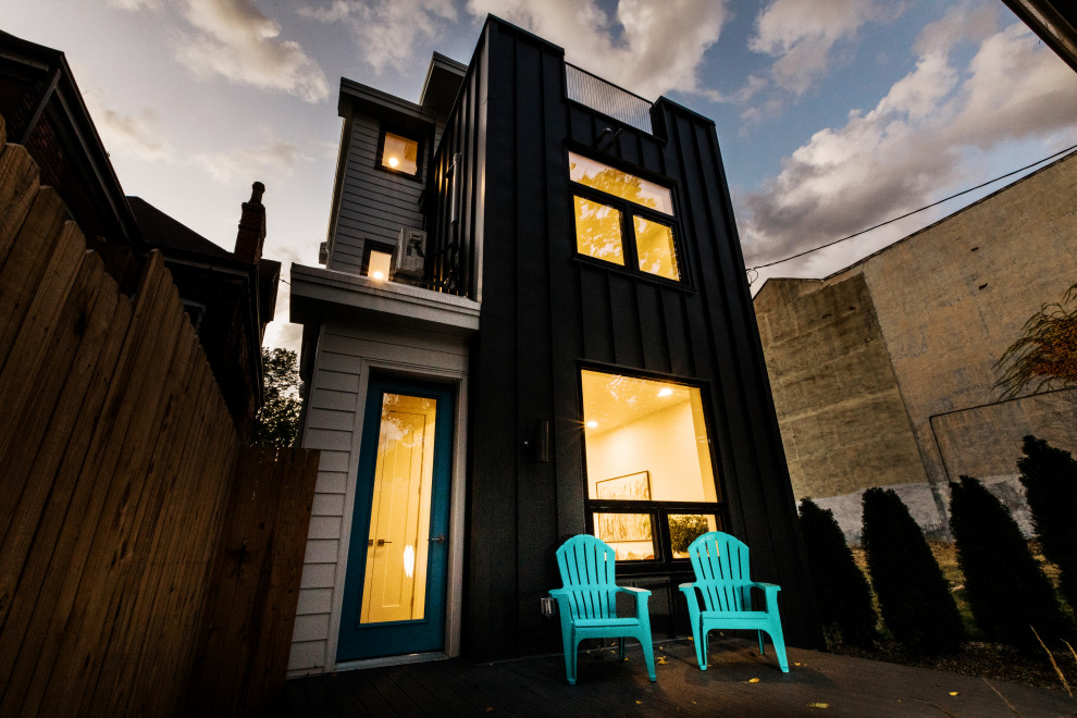 Example of a large transitional home design design
