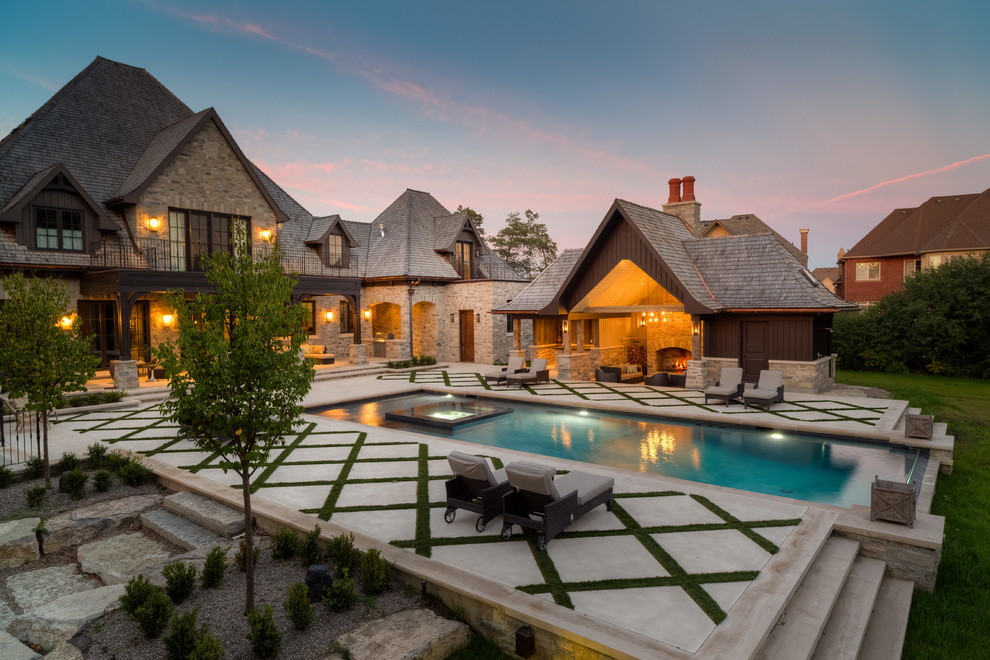Hot tub - large traditional backyard rectangular hot tub idea in Toronto