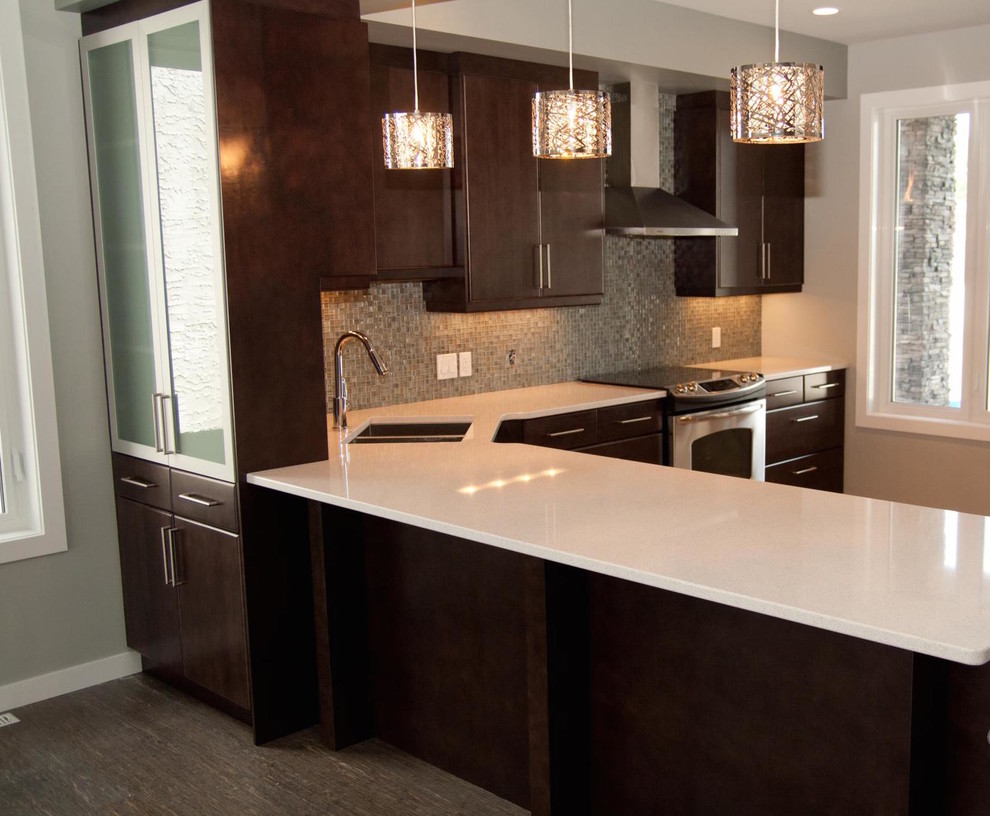 Example of a mid-sized transitional l-shaped dark wood floor eat-in kitchen design with a double-bowl sink, shaker cabinets, dark wood cabinets, metallic backsplash, stainless steel appliances and a peninsula