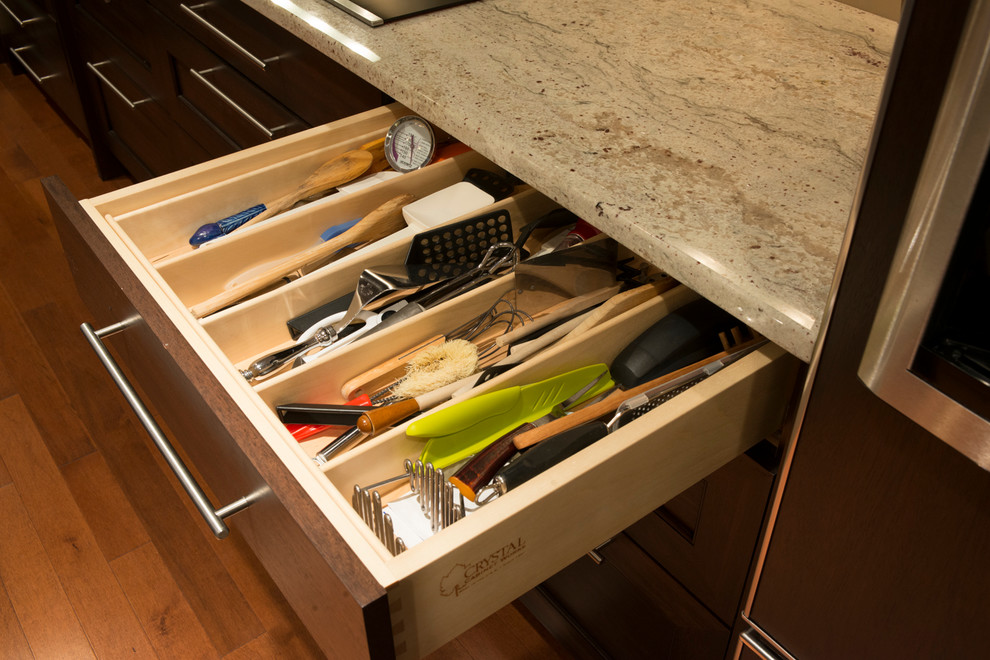 Example of a transitional home design design in Vancouver