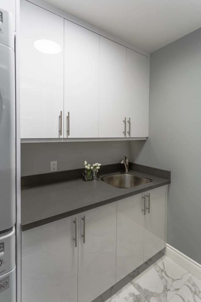 Inspiration for a small contemporary laundry room in Toronto.