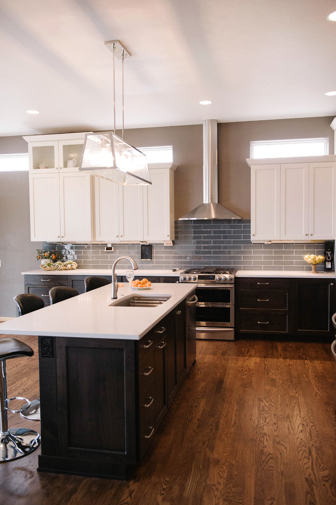 Example of a transitional kitchen design in Denver