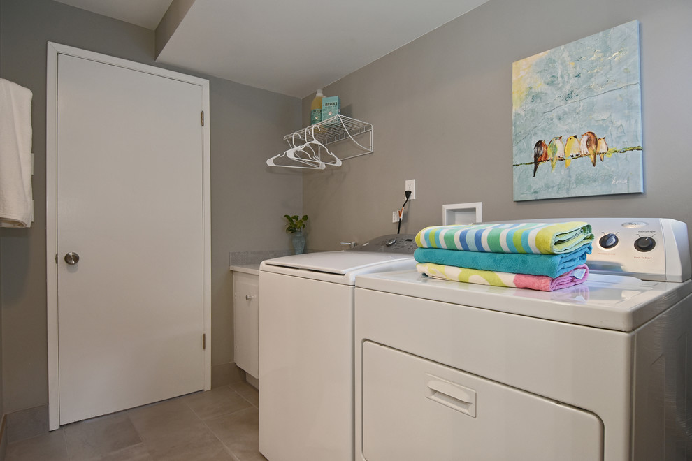 This is an example of a midcentury laundry room in Seattle.