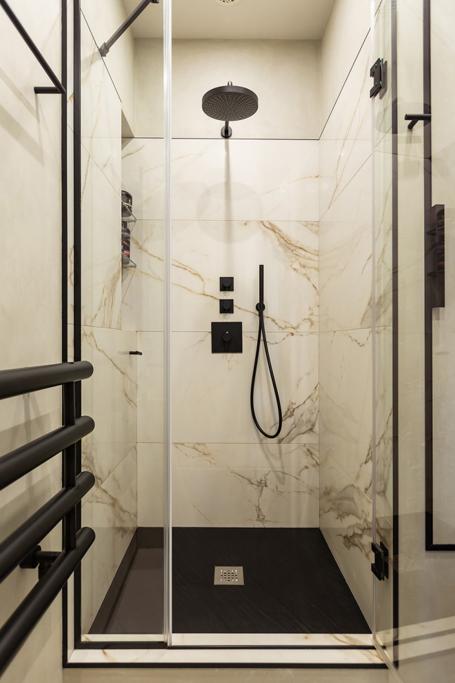 Inspiration for a small contemporary 3/4 bathroom in Saint Petersburg with beaded inset cabinets, grey cabinets, an alcove shower, a bidet, gray tile, porcelain tile, grey walls, porcelain floors, a pedestal sink, concrete benchtops, beige floor, a hinged shower door and grey benchtops.