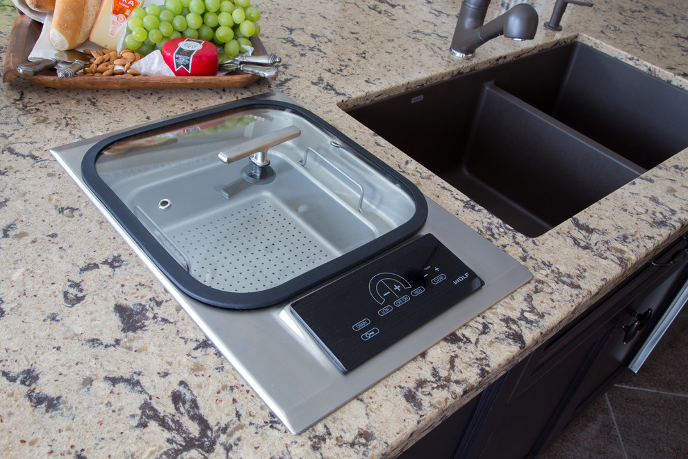 Example of a transitional kitchen design in Toronto