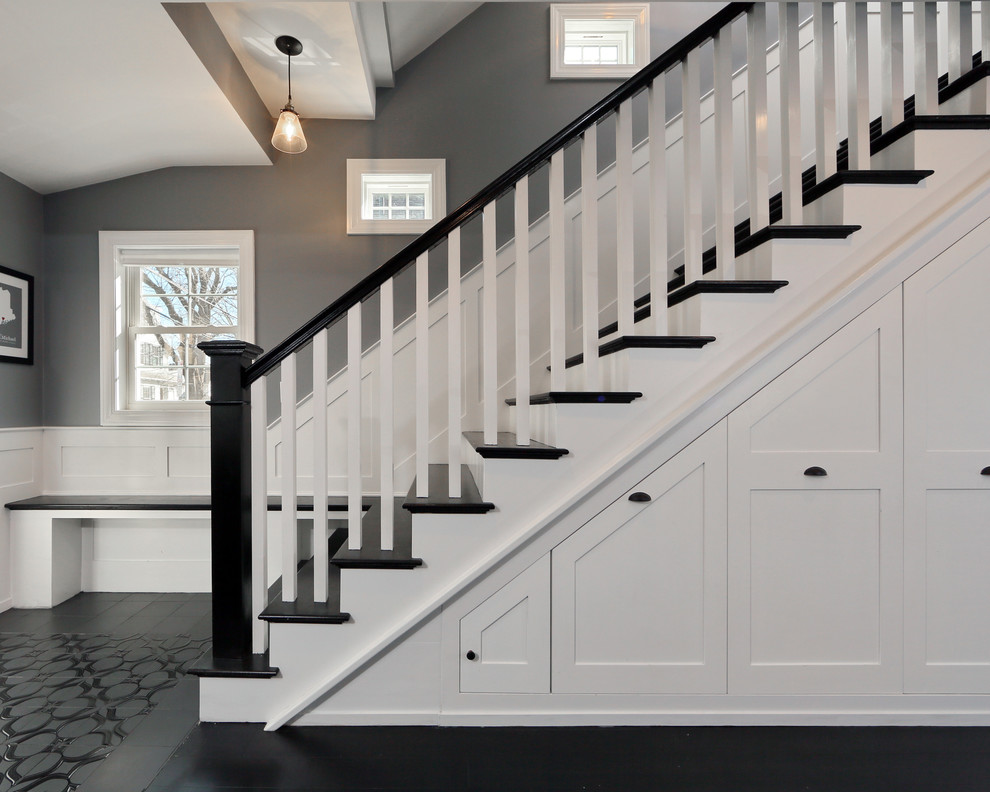 Inspiration for a mid-sized modern wood straight staircase in Boston with wood risers.