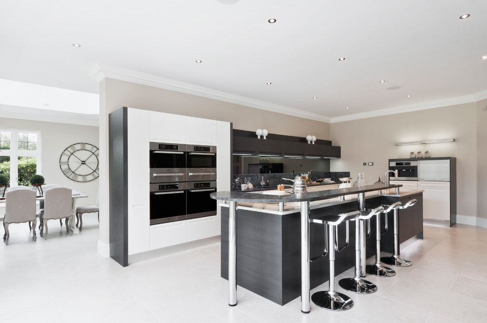 This is an example of a modern kitchen in Berkshire with stainless steel appliances.