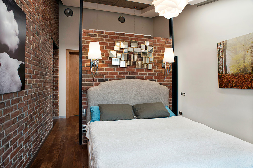 Design ideas for an industrial bedroom in Other.