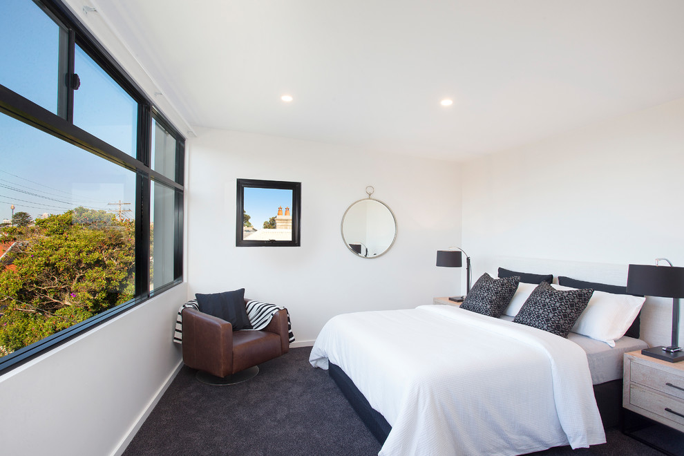 Design ideas for a contemporary guest bedroom in Sydney with white walls, carpet and grey floor.