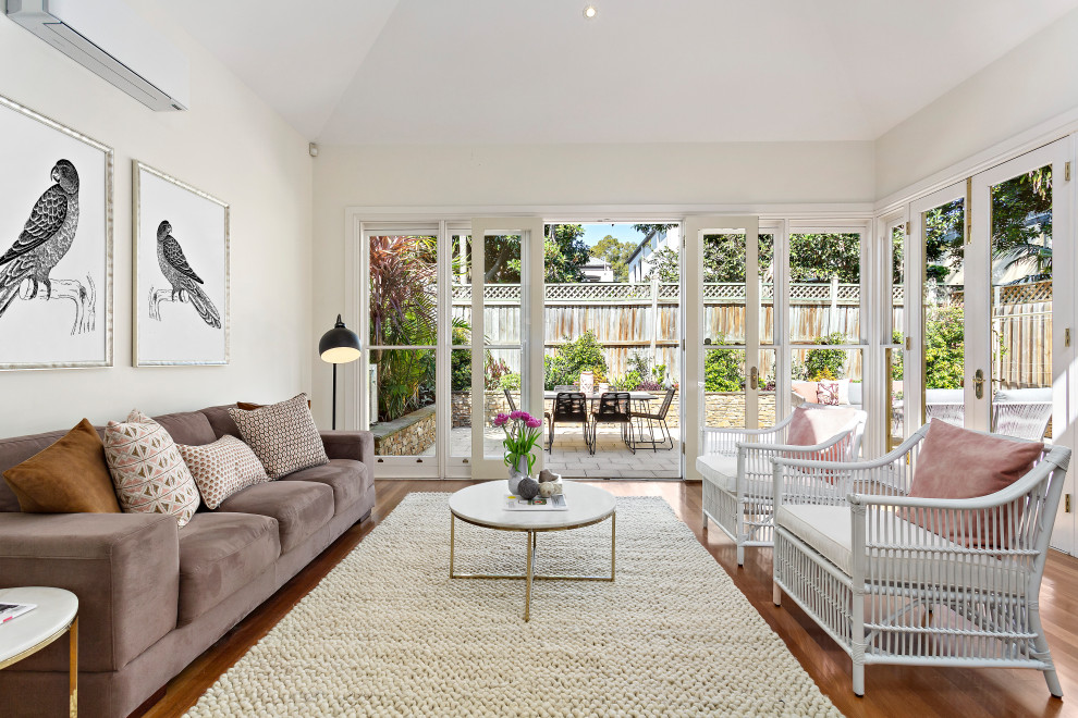 Design ideas for a transitional open concept living room in Sydney.