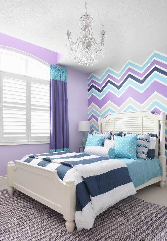 Design ideas for a transitional kids' room for girls in Toronto with multi-coloured walls.