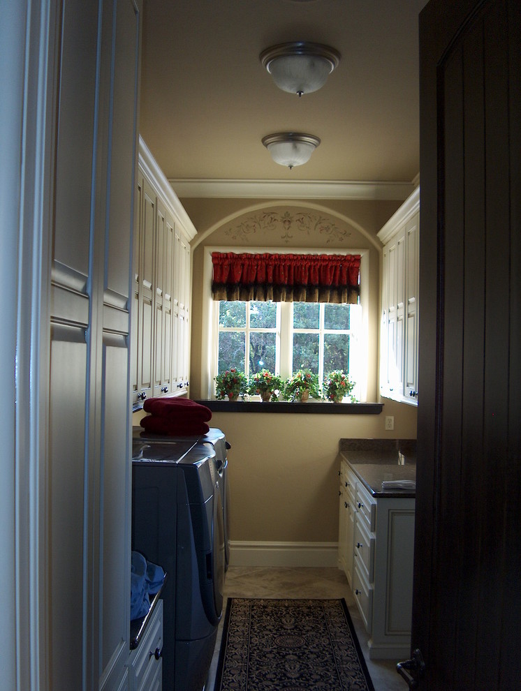 This is an example of a mediterranean laundry room in Oklahoma City.
