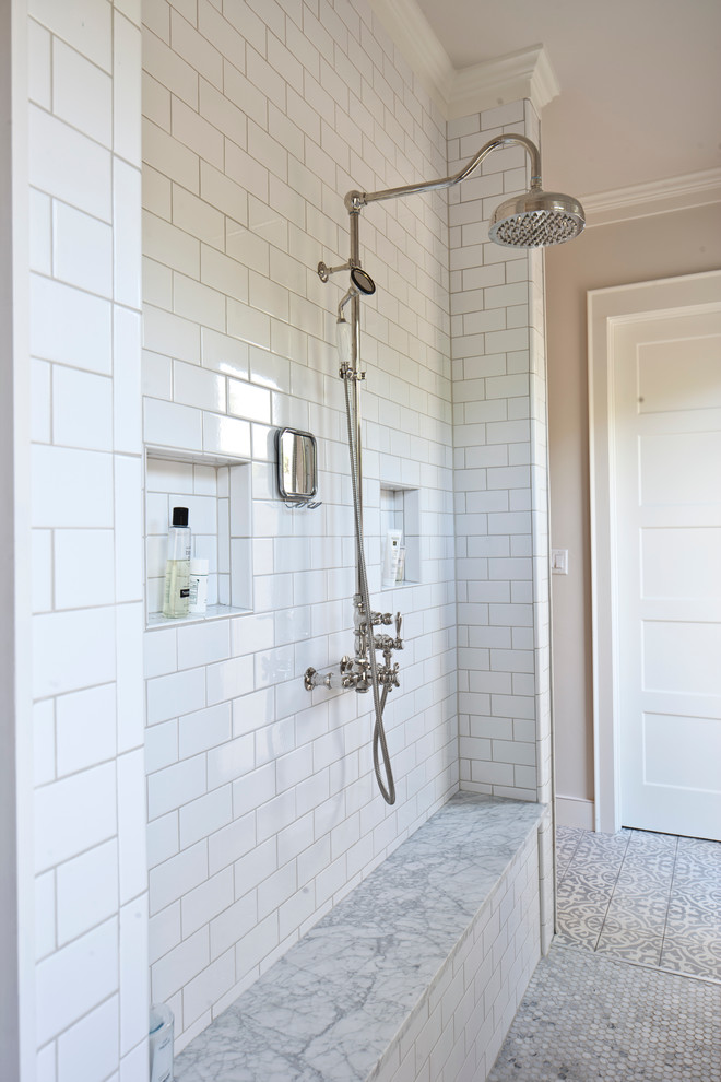 Inspiration for a country bathroom in Austin with white tile and subway tile.