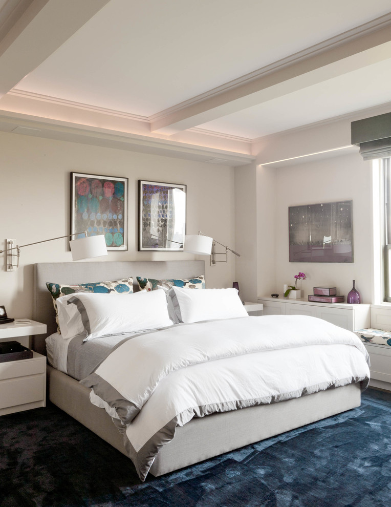 Inspiration for a transitional bedroom in New York with white walls, carpet and blue floor.