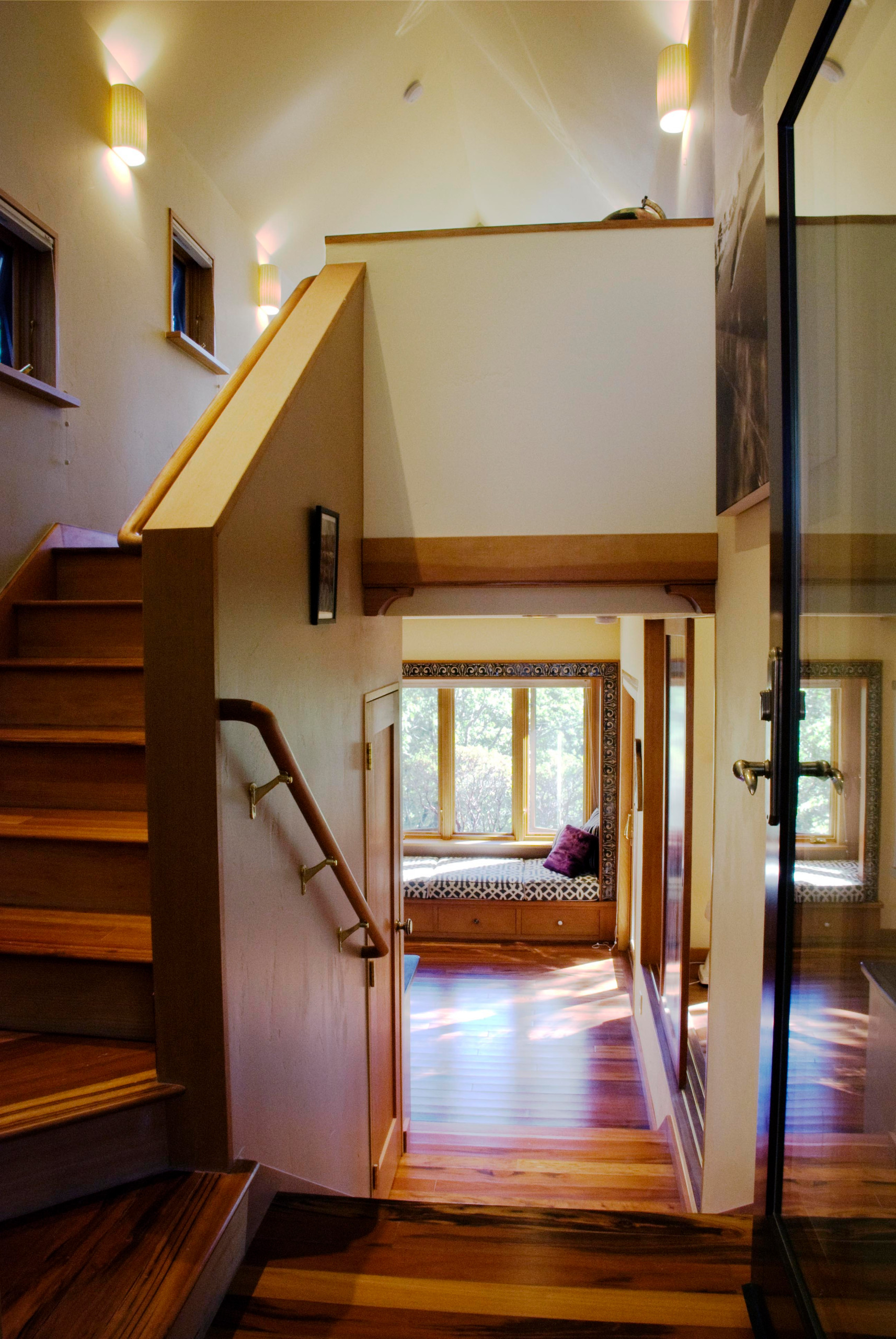 Entry with view to loft above and window seat below