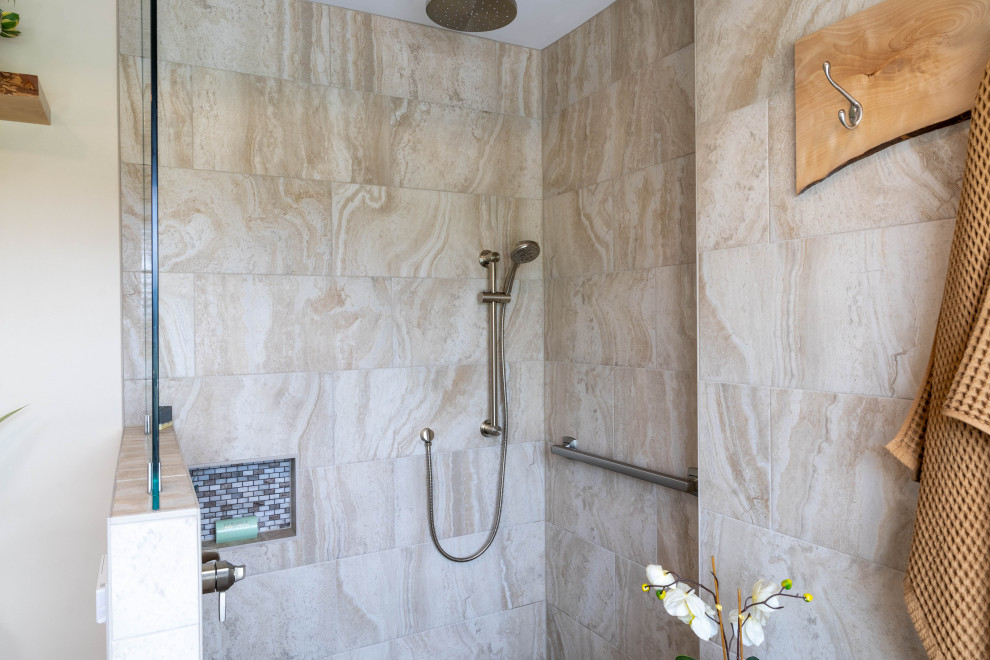 Inspiration for a craftsman master beige tile brown floor and single-sink bathroom remodel in Other with light wood cabinets, a bidet, beige walls, an undermount sink, white countertops and a niche