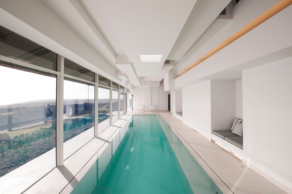 Contemporary indoor rectangular pool in Melbourne.