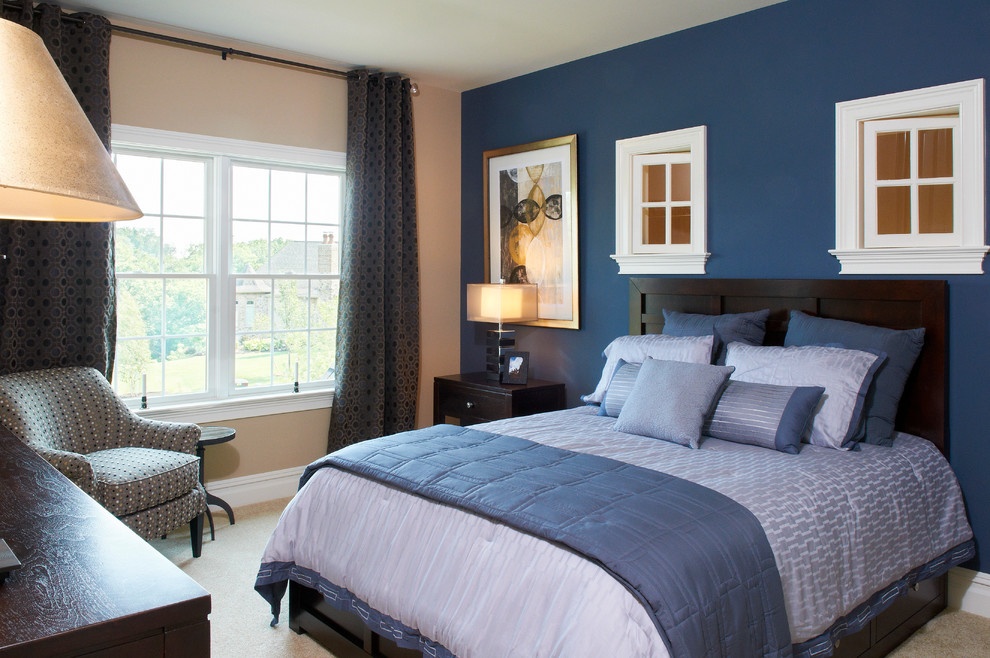 Design ideas for a large transitional guest bedroom in Other with blue walls and carpet.