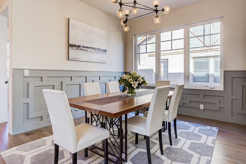 Transitional light wood floor dining room photo in Denver with multicolored walls