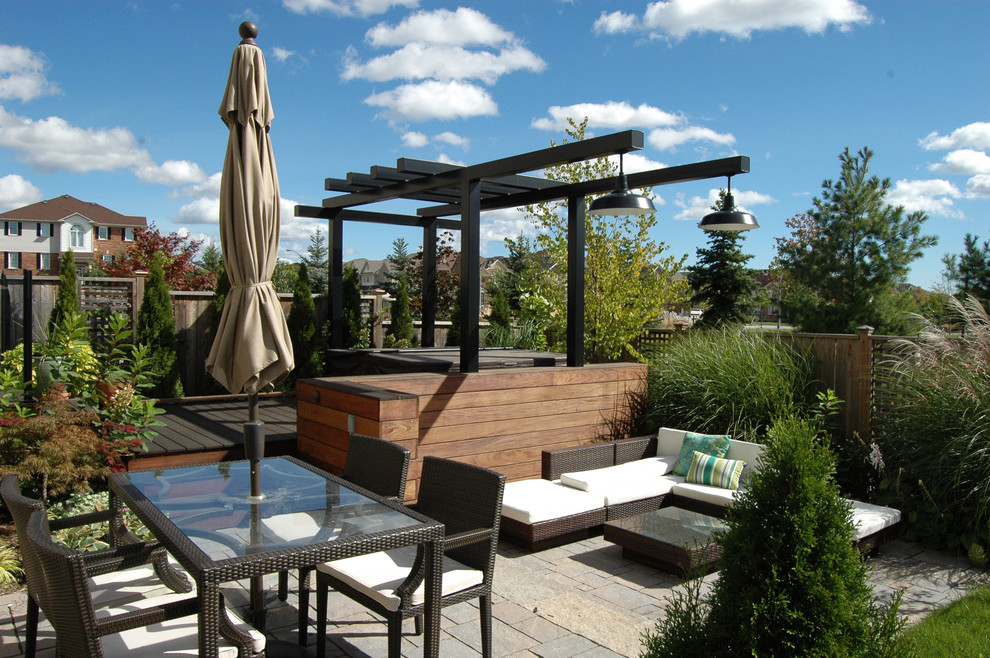 Transitional patio photo in Toronto