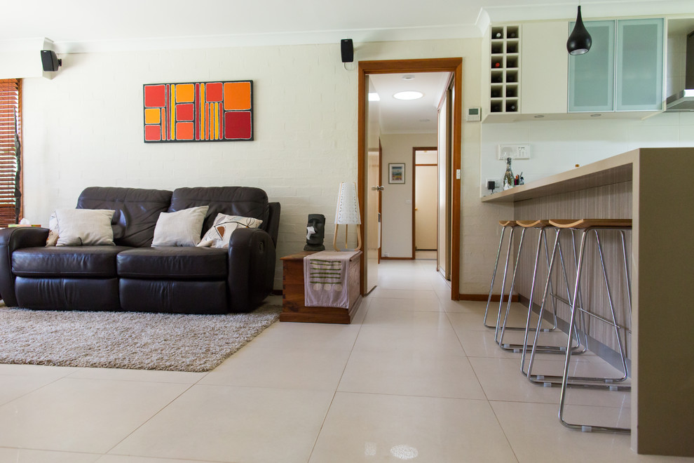 Large contemporary living room in Canberra - Queanbeyan with ceramic floors and beige floor.