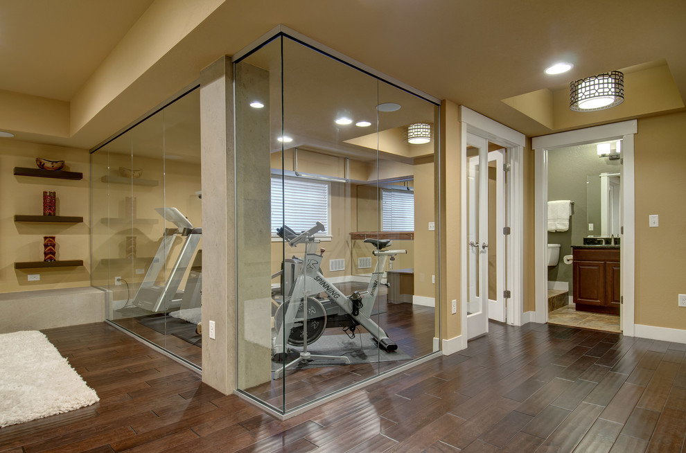Mid-sized transitional multipurpose gym in Denver with beige walls, dark hardwood floors and brown floor.