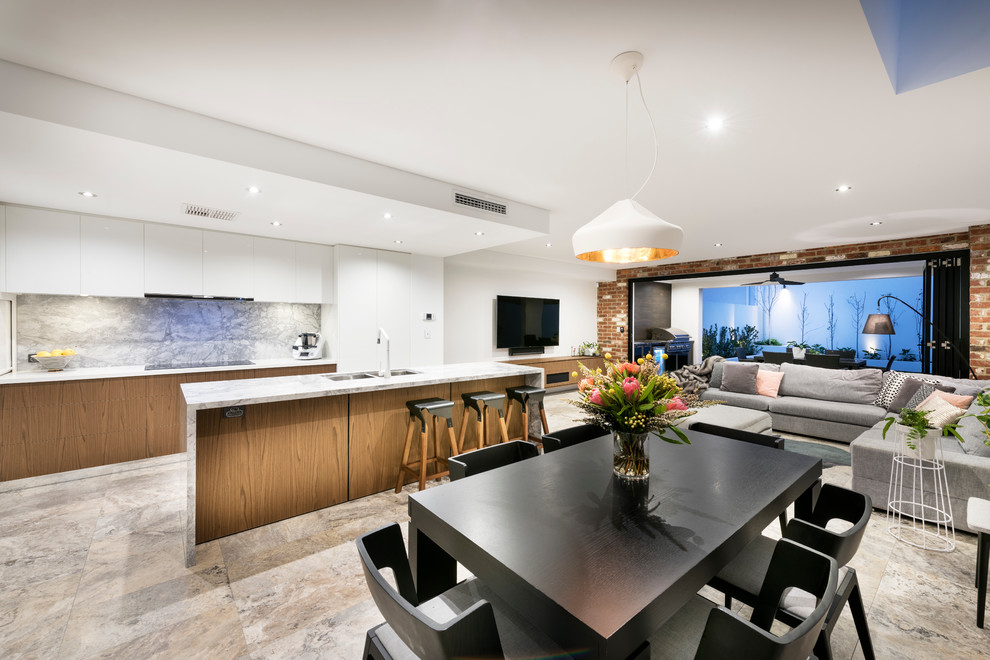 This is an example of a contemporary open plan dining in Perth with white walls.