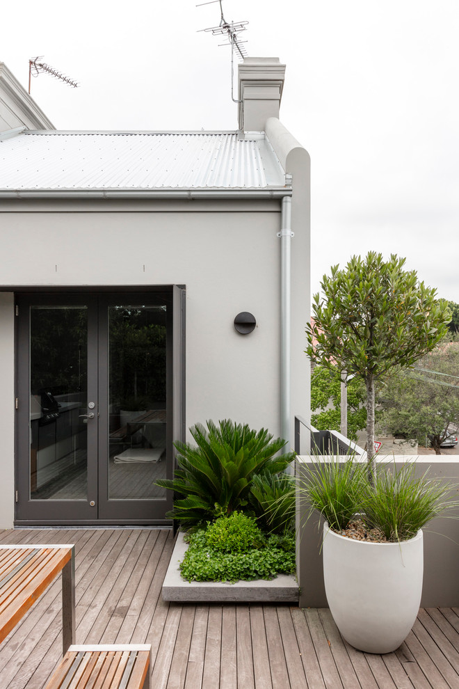 This is an example of a contemporary deck in Sydney.