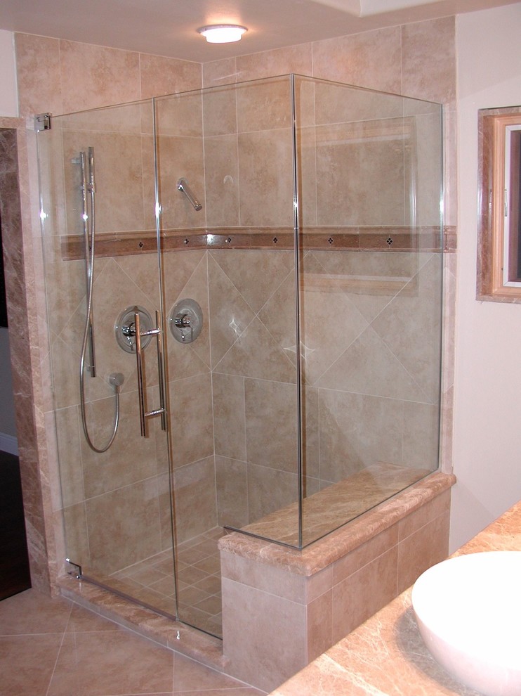 Traditional bathroom in Other with a corner shower, beige tile, ceramic tile, ceramic floors, a vessel sink, beige floor and a hinged shower door.