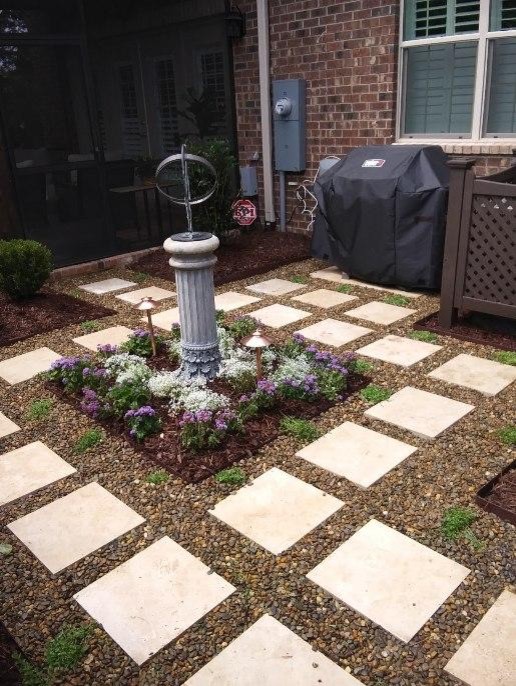 Photo of a small traditional courtyard partial sun formal garden for summer in Charlotte with a garden path and concrete pavers.