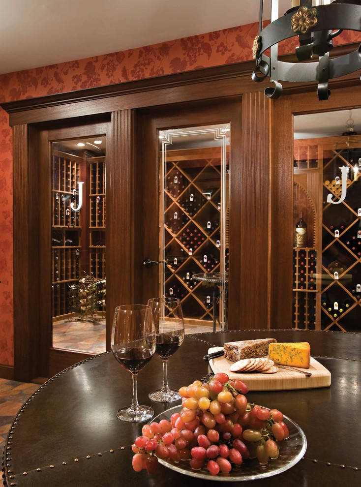 Design ideas for an expansive traditional wine cellar in Other with limestone floors and storage racks.