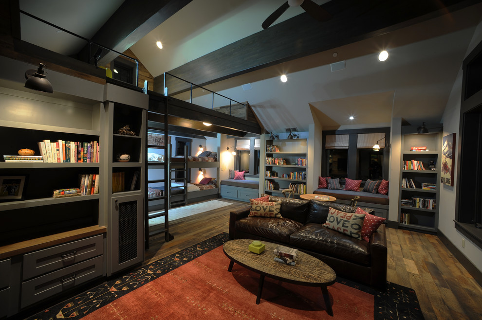 This is an example of a large modern loft-style family room in San Francisco with a game room.