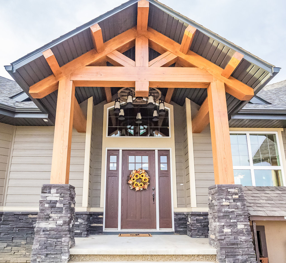 Mountain style entryway photo in Calgary