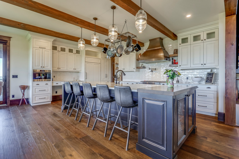 Example of a mountain style kitchen design in Calgary