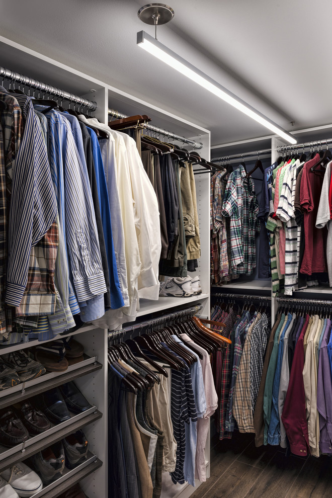 This is an example of a transitional storage and wardrobe in Chicago.