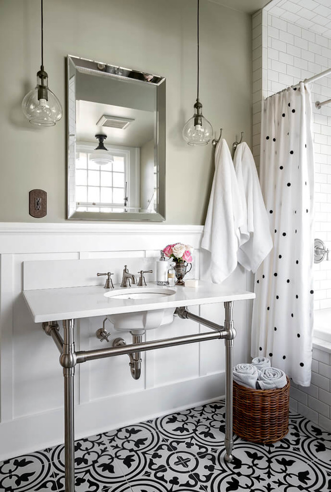 Design ideas for a mid-sized traditional bathroom in Vancouver with a drop-in tub, white tile, subway tile, beige walls, multi-coloured floor, a shower curtain, a shower/bathtub combo and a console sink.