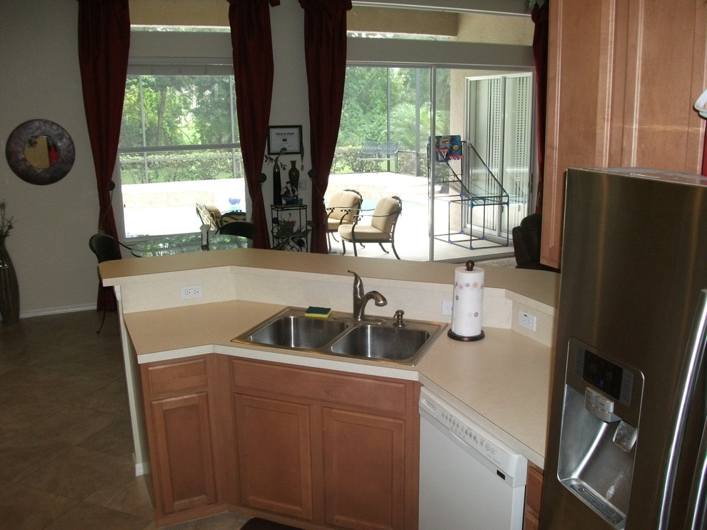 Keep the eat in kitchen or extend the countertop?