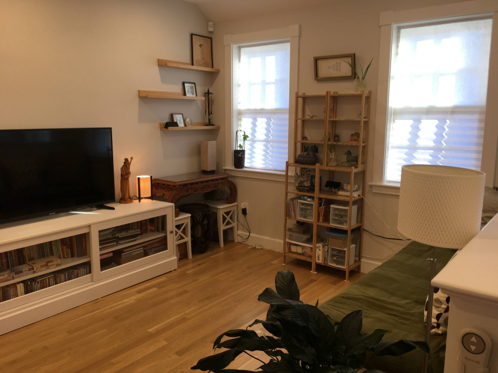 Example of a transitional home design design in Boston