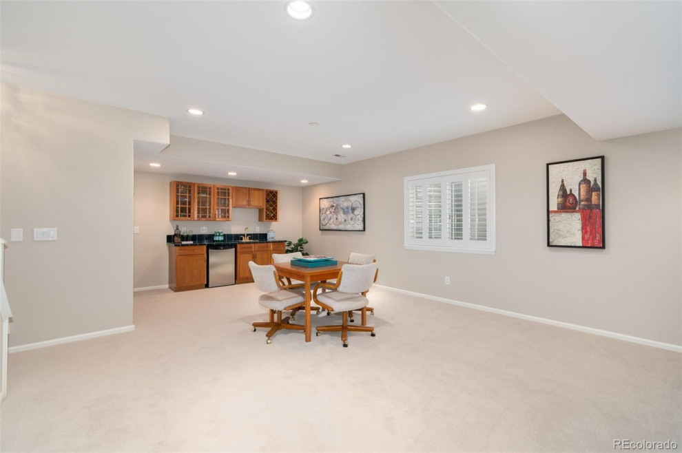 Basement - transitional basement idea in Denver