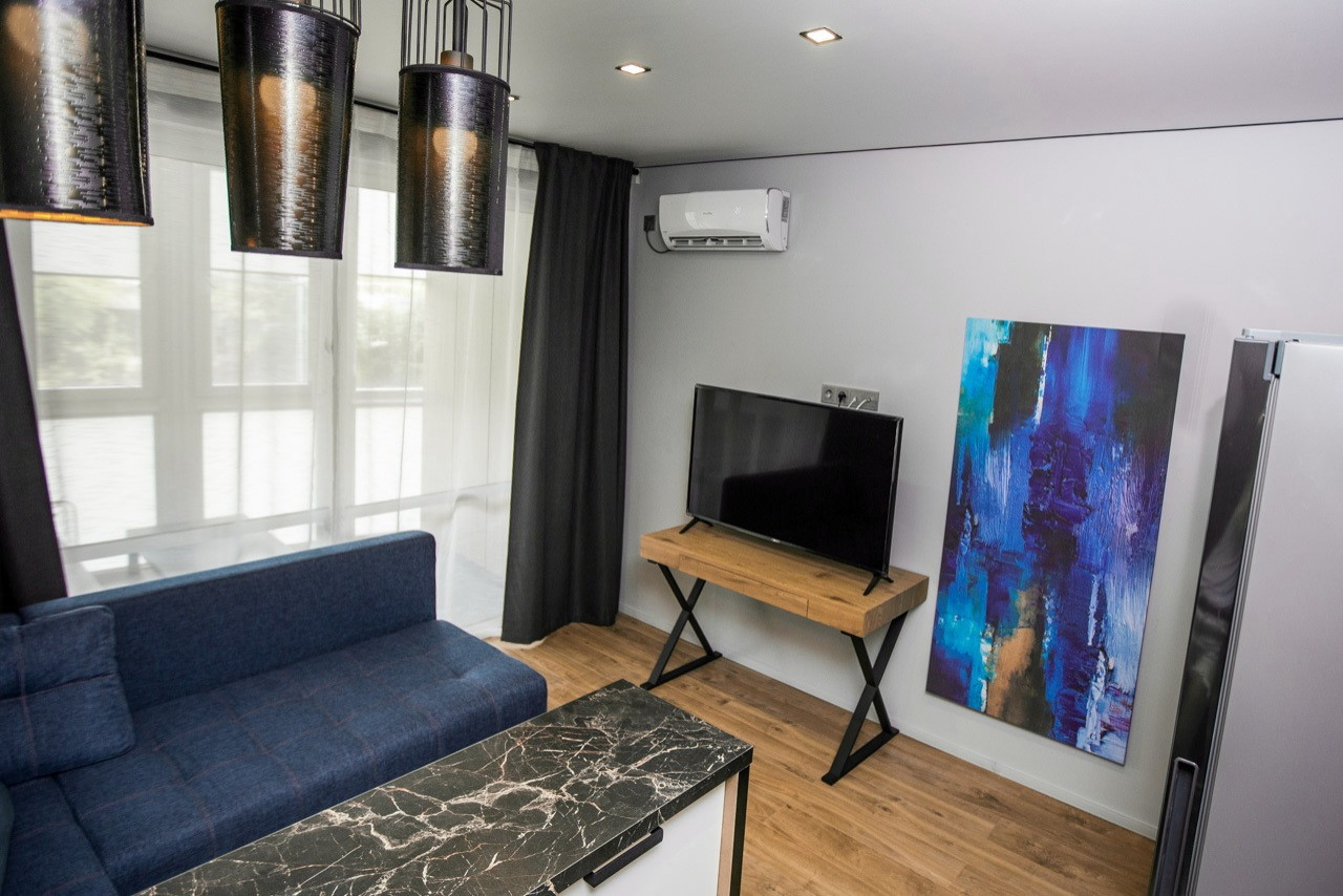 Гостиная 1-х комнатной студии квартиры в Сочи ул.Фабрициуса