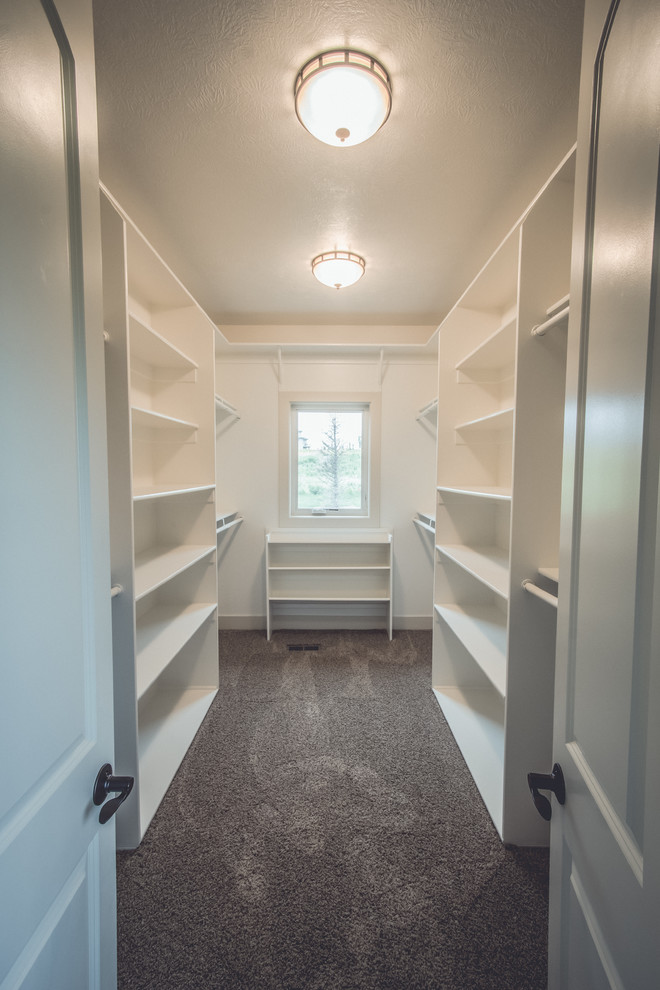 This is an example of a contemporary storage and wardrobe in Omaha.